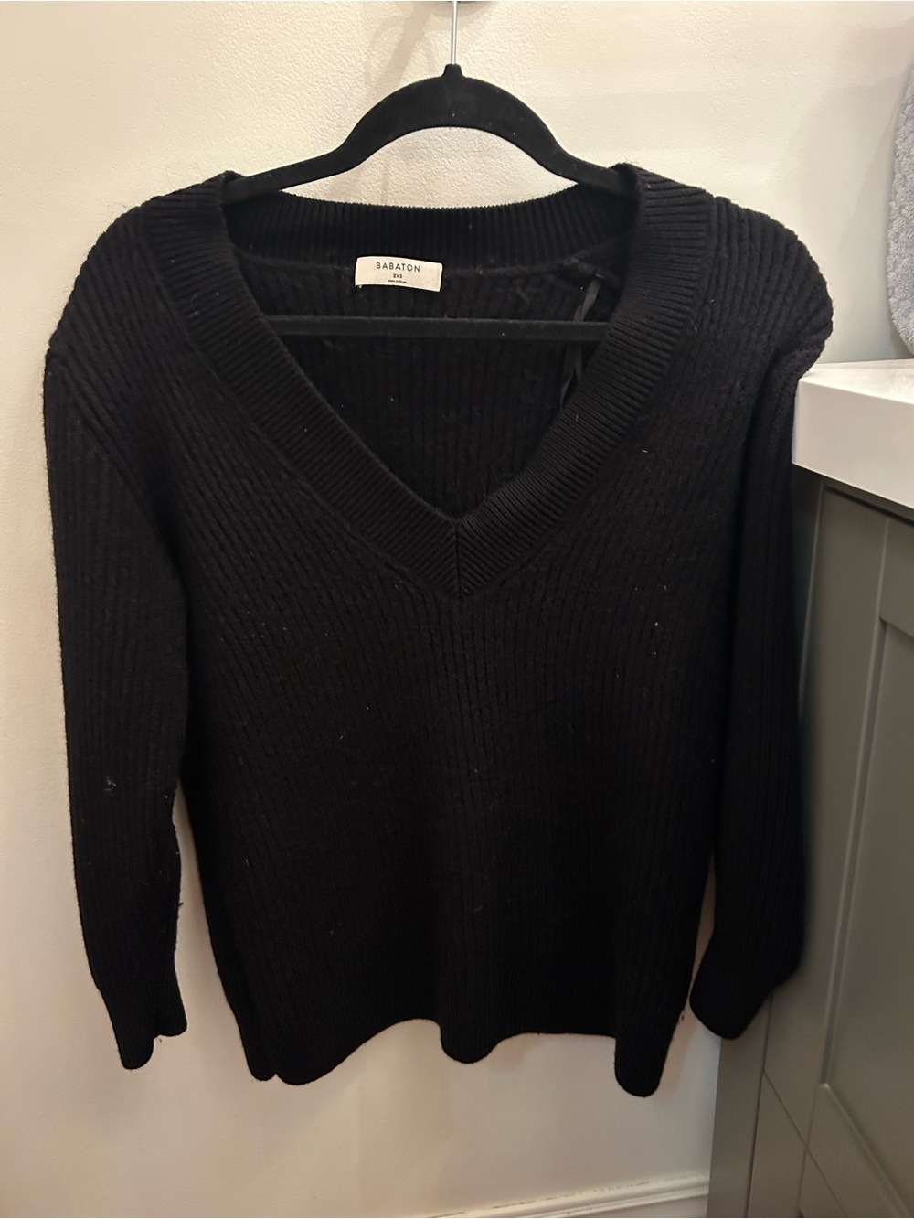Babaton Black Ribbed V-Neck merino wool Sweater.